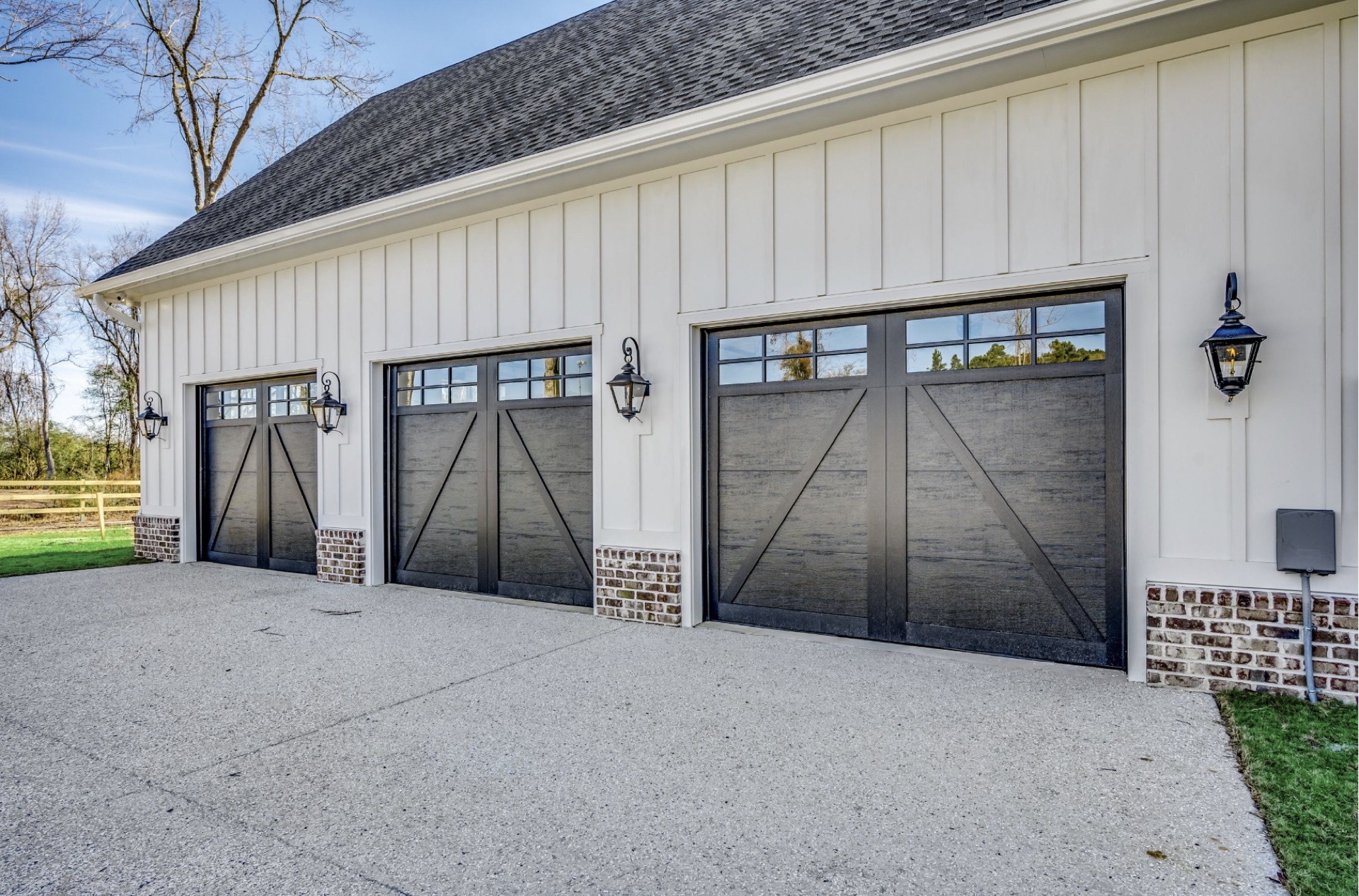 Detached garage with custom carriage doors at 3751 Highway 319