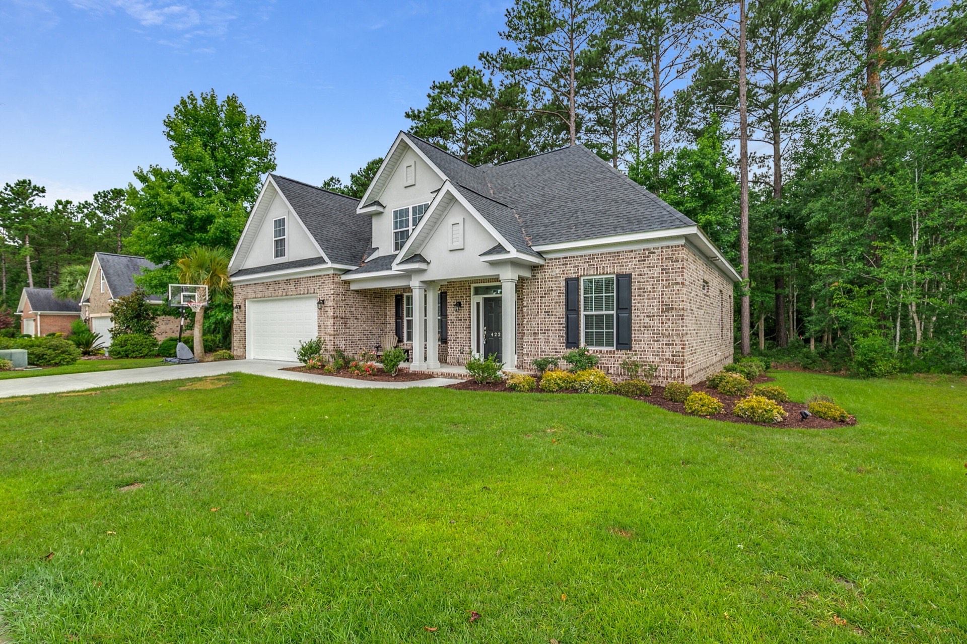Approach to the custom home at 422 Megan Ann